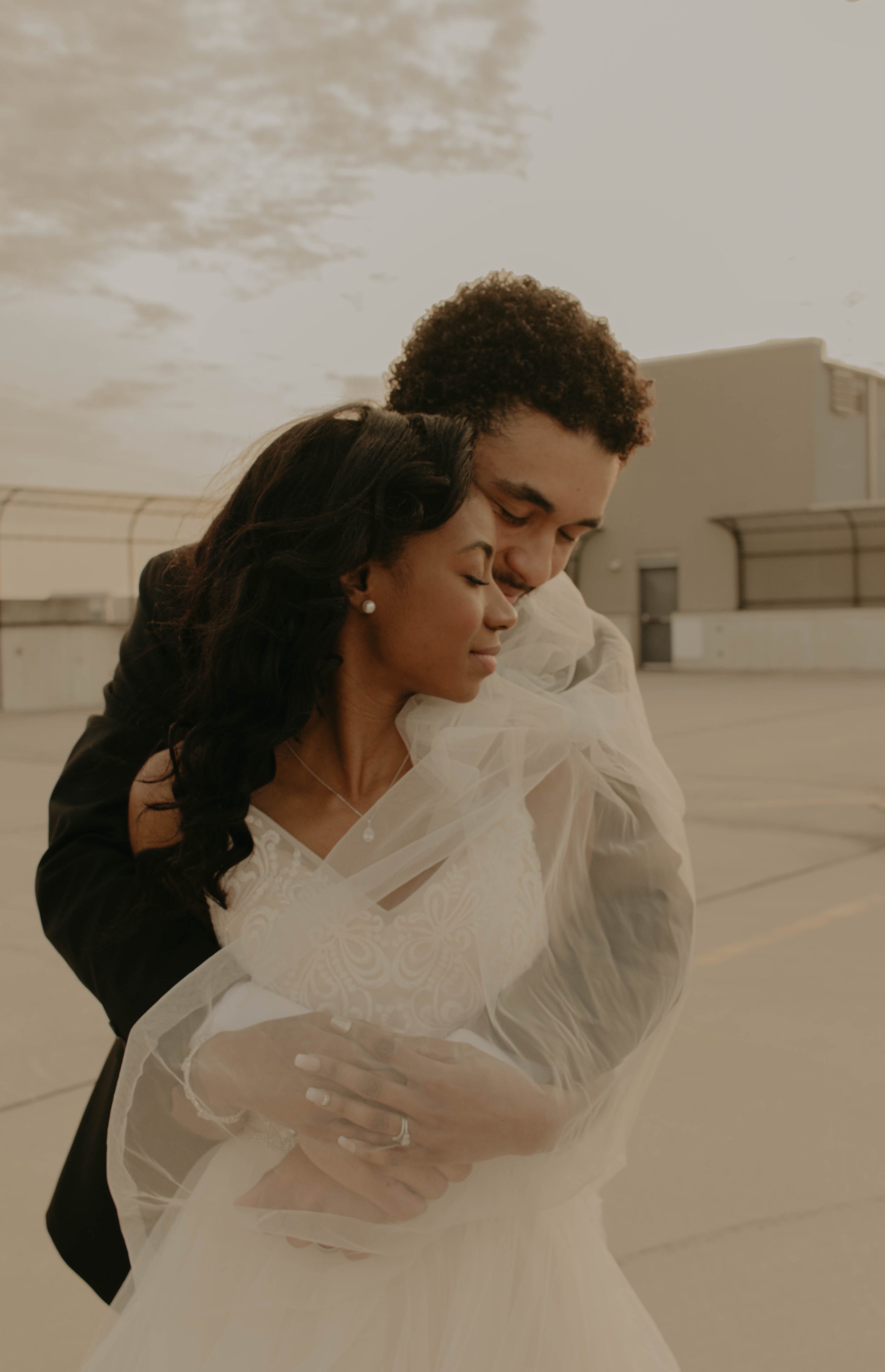 Quiana and Mark embracing