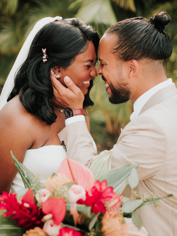 bride and groom smiling
